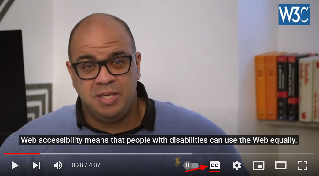 A man talking about web accessibility with caption displaying what he says in real-time